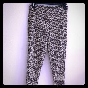 Black and gold Melissa Paige pants.